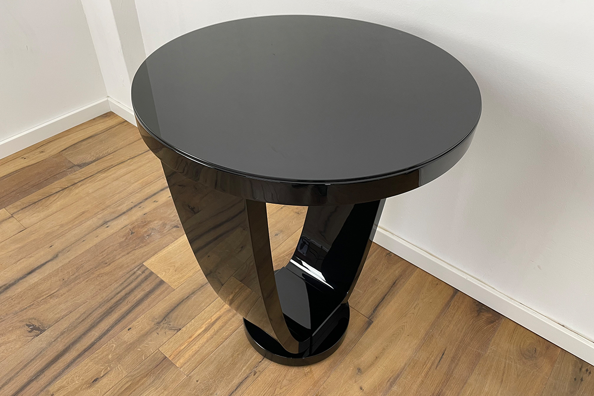 Art Deco style bistro table with black piano lacquer and Lacobel glass top