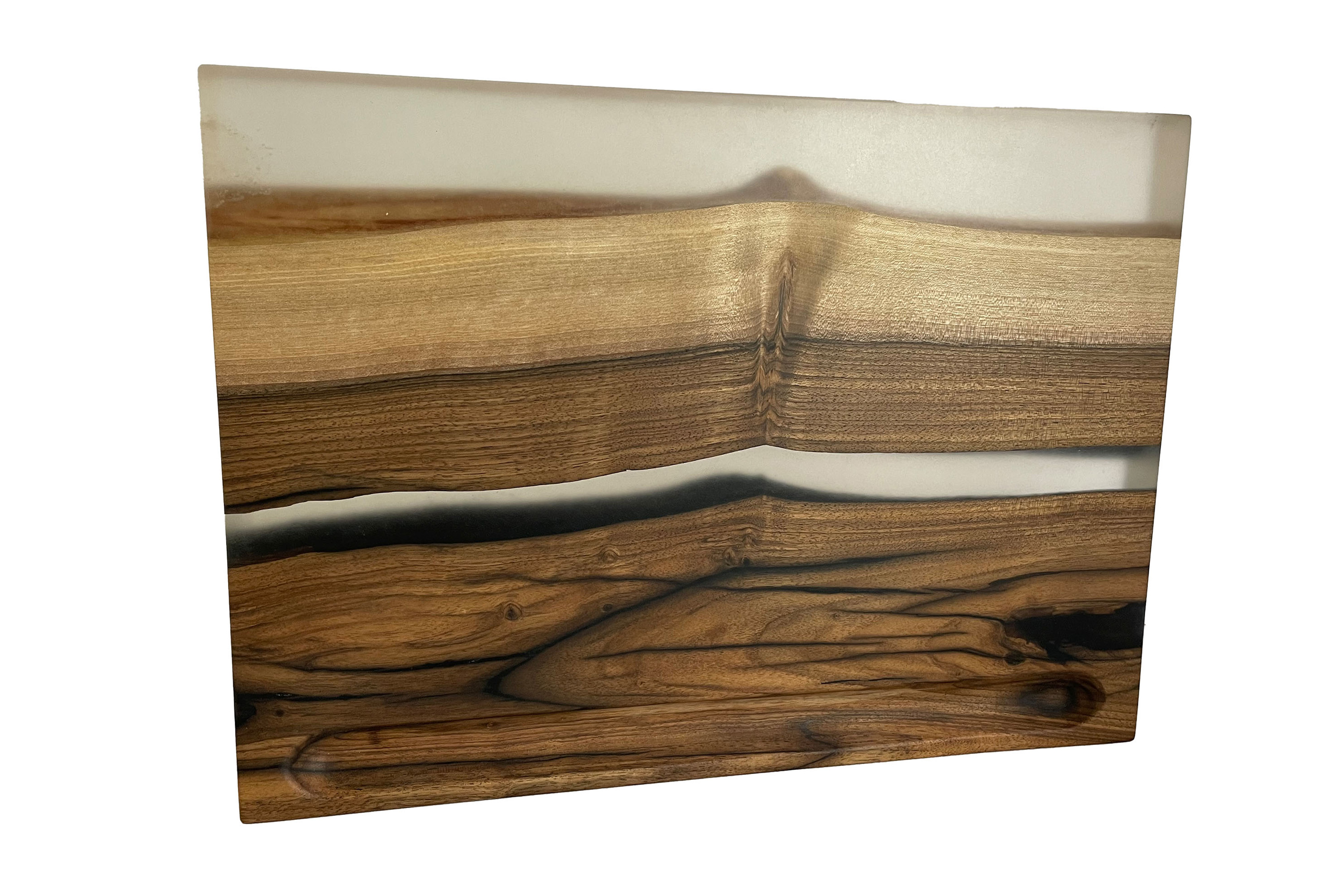Cutting board made of walnut and cast with epoxy