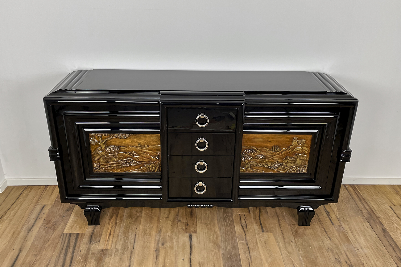 Art Deco sideboard around 1930 with two carved paintings