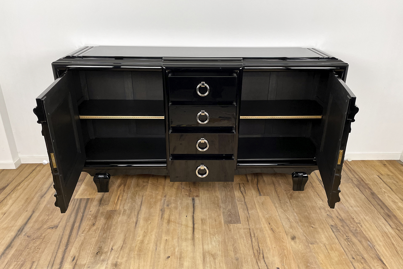 Art Deco sideboard around 1930 with two carved paintings