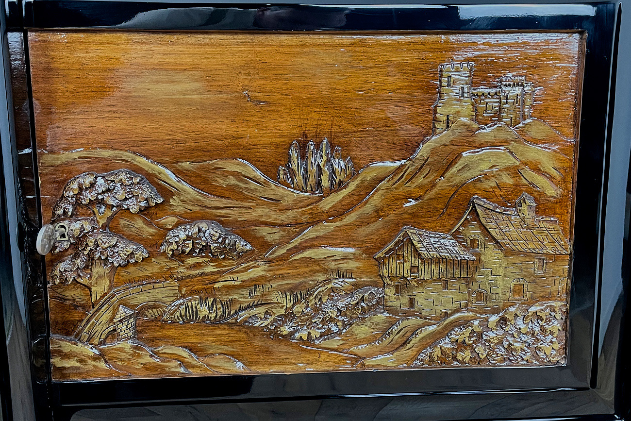 Art Deco sideboard around 1930 with two carved paintings