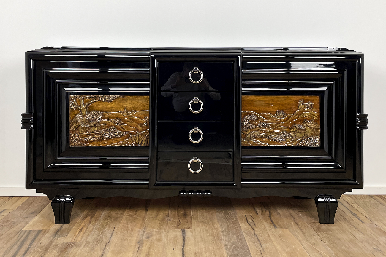 Art Deco sideboard around 1930 with two carved paintings