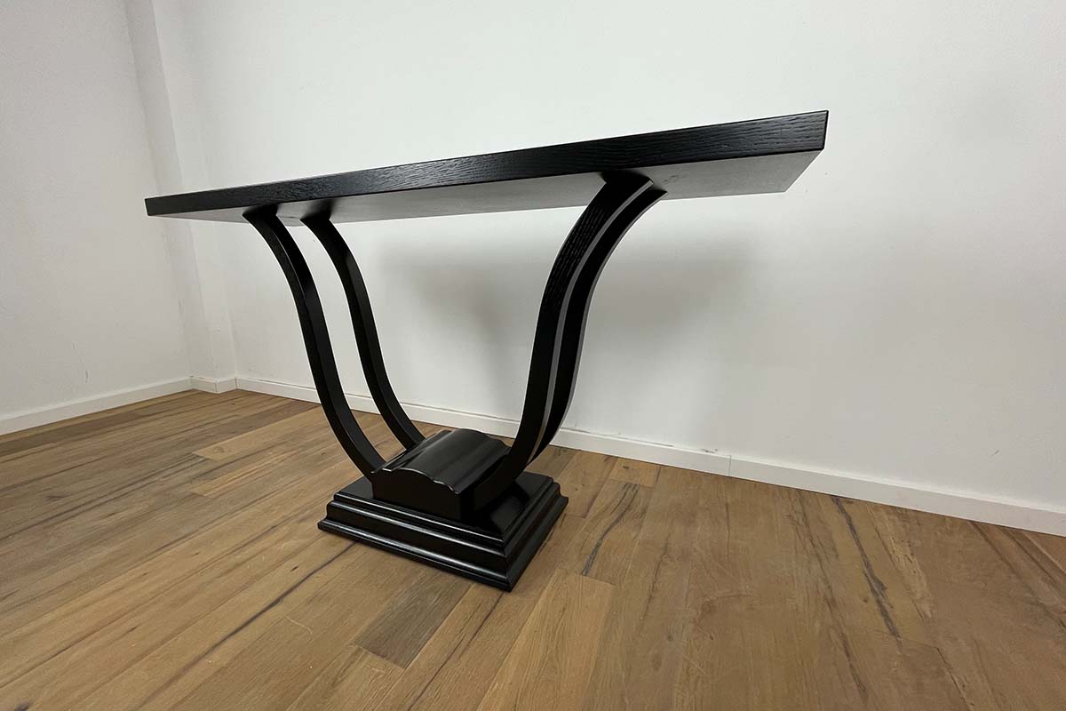 Console with delicate curved legs in oak