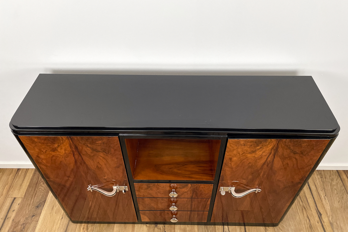 Art Deco highboard with a fantastic veneer and mirrored compartment, the original handles have been newly chrome-plated