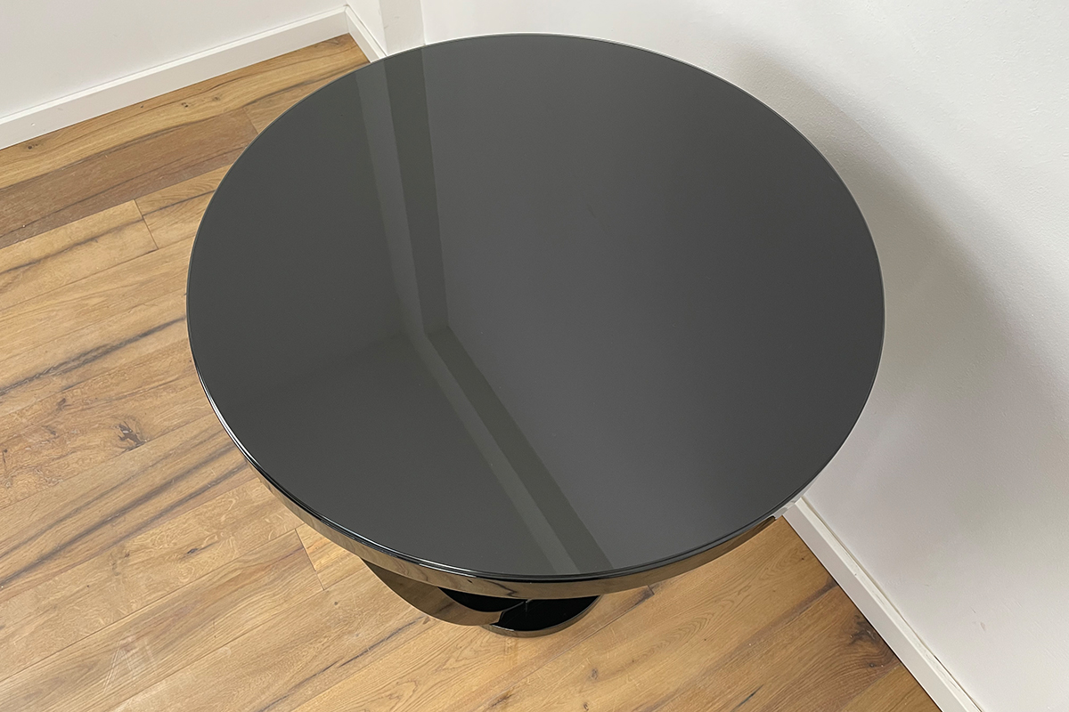 Art Deco style bistro table with black piano lacquer and Lacobel glass top