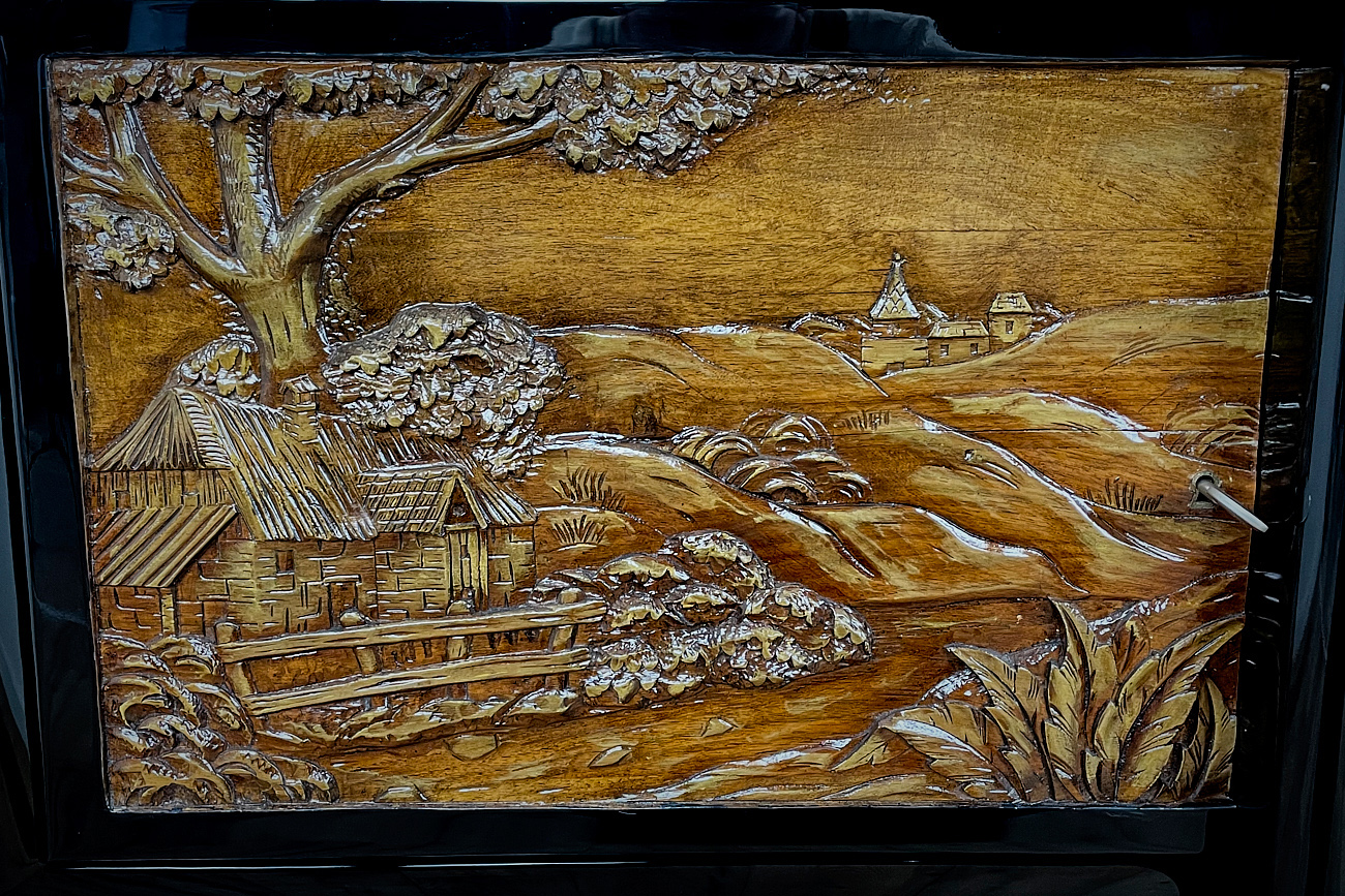 Art Deco sideboard around 1930 with two carved paintings