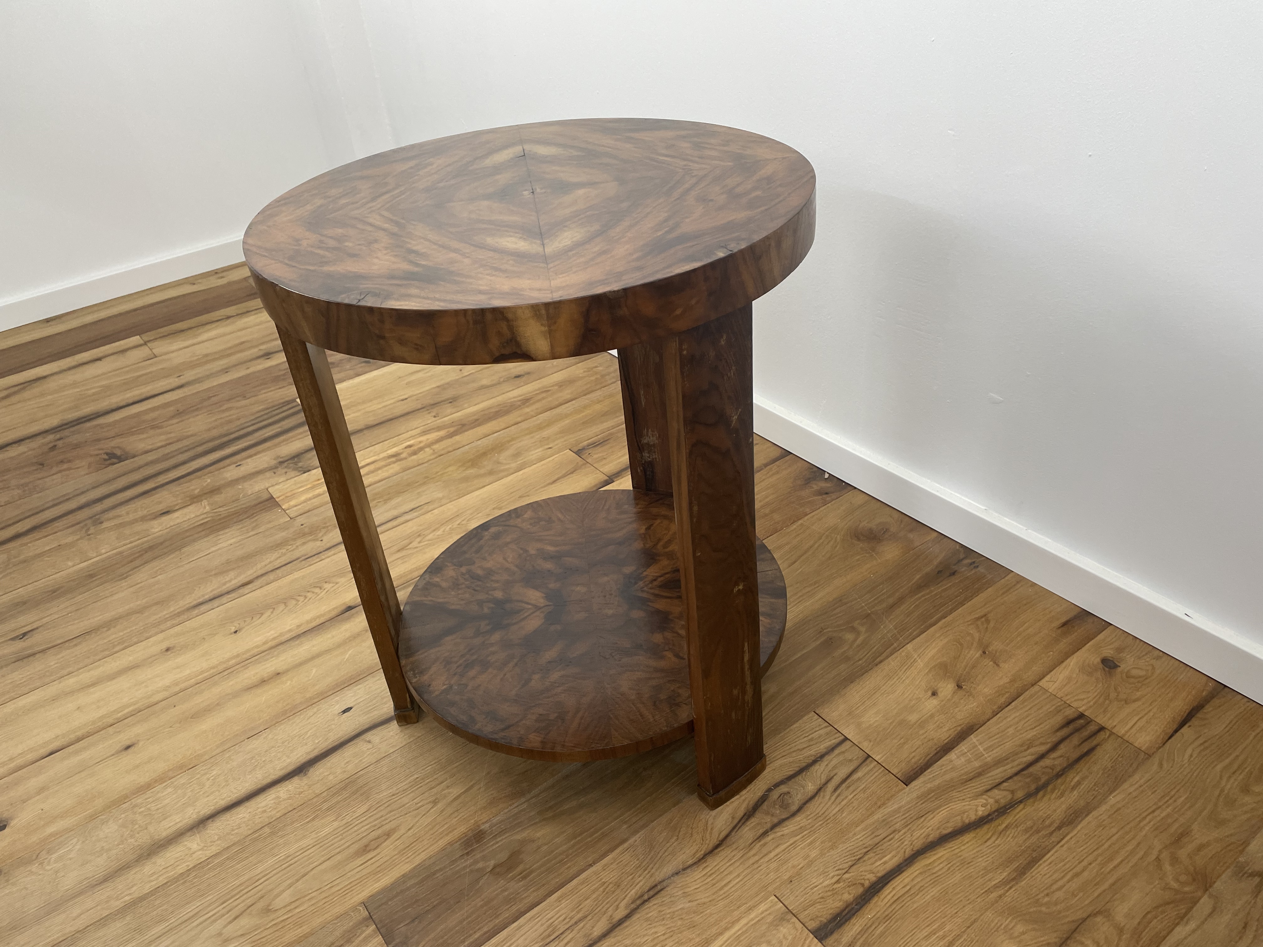 Art Deco side table with fantastic walnut veneer on three legs from near Paris around 1925