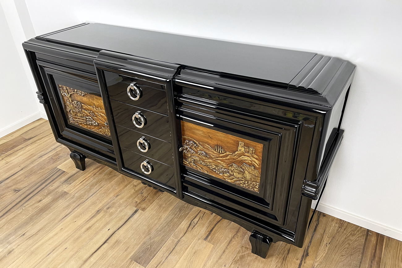 Art Deco sideboard around 1930 with two carved paintings