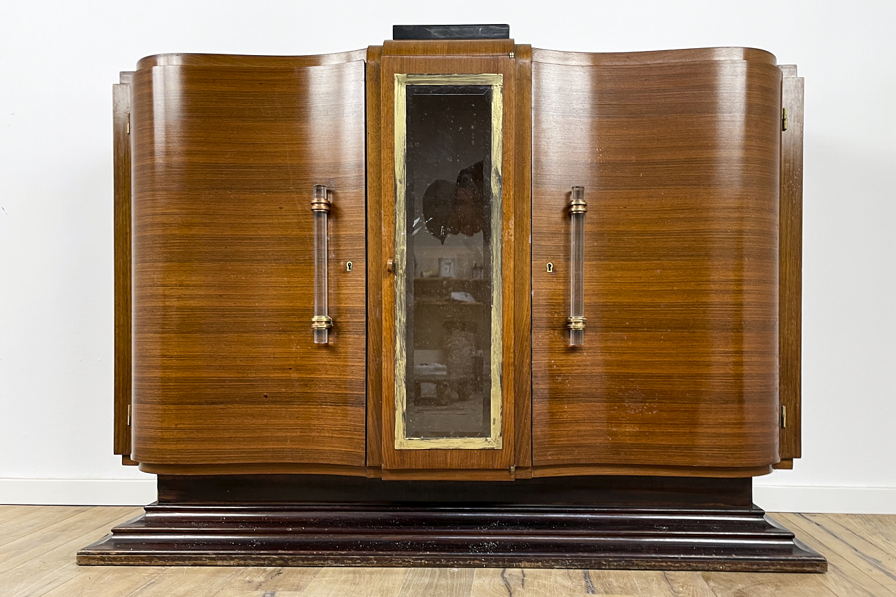 Art Deco chest of drawers in rosewood veneer with glass handles from France around 1925 with a display case