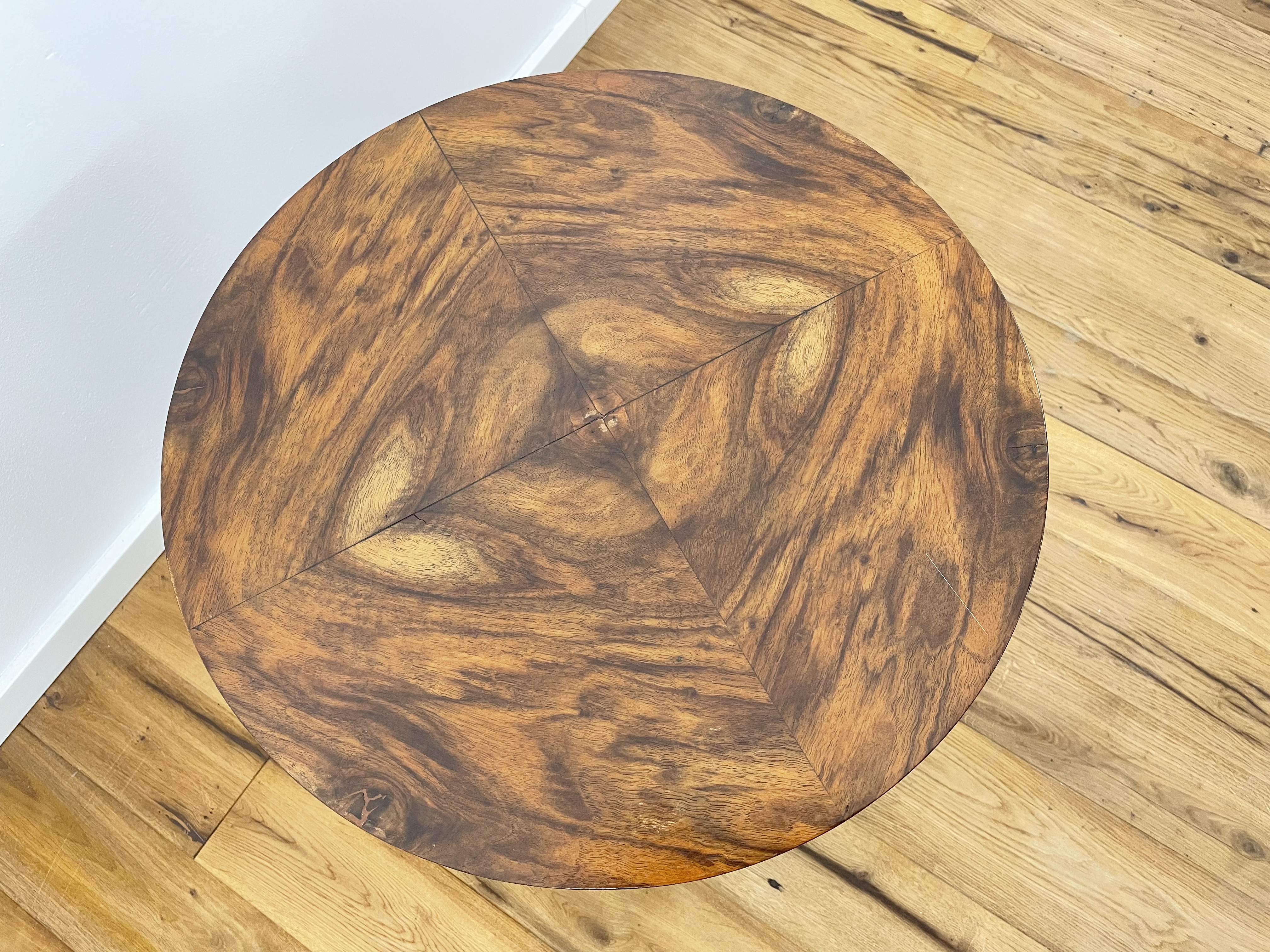 Art Deco side table with fantastic walnut veneer on three legs from near Paris around 1925