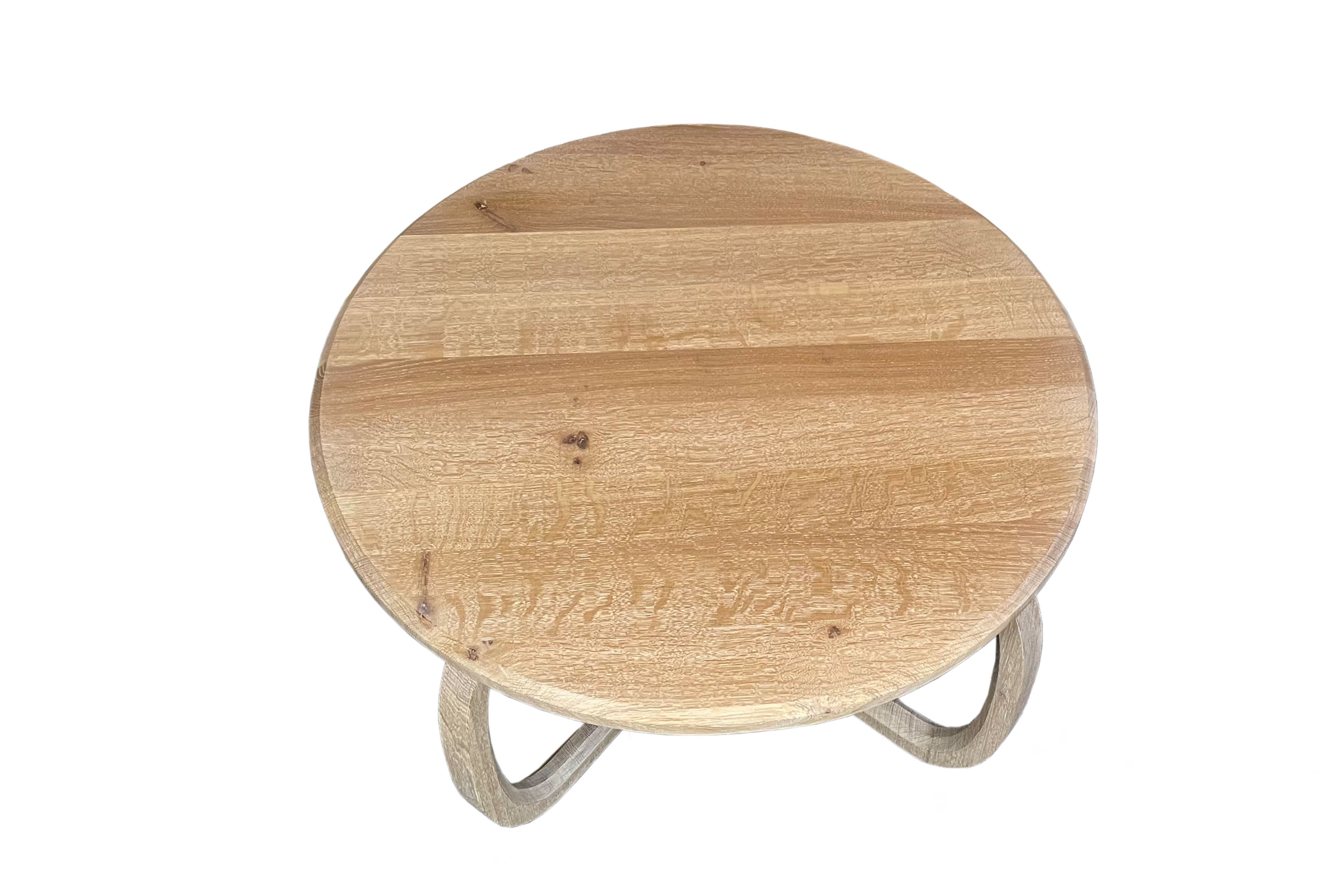 Modern coffee table made of oak with delicate legs