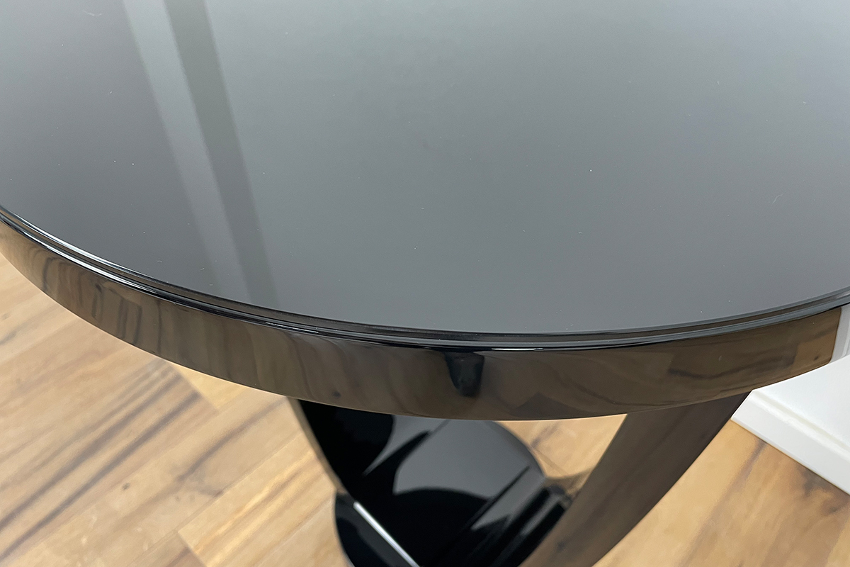 Art Deco style bistro table with black piano lacquer and Lacobel glass top