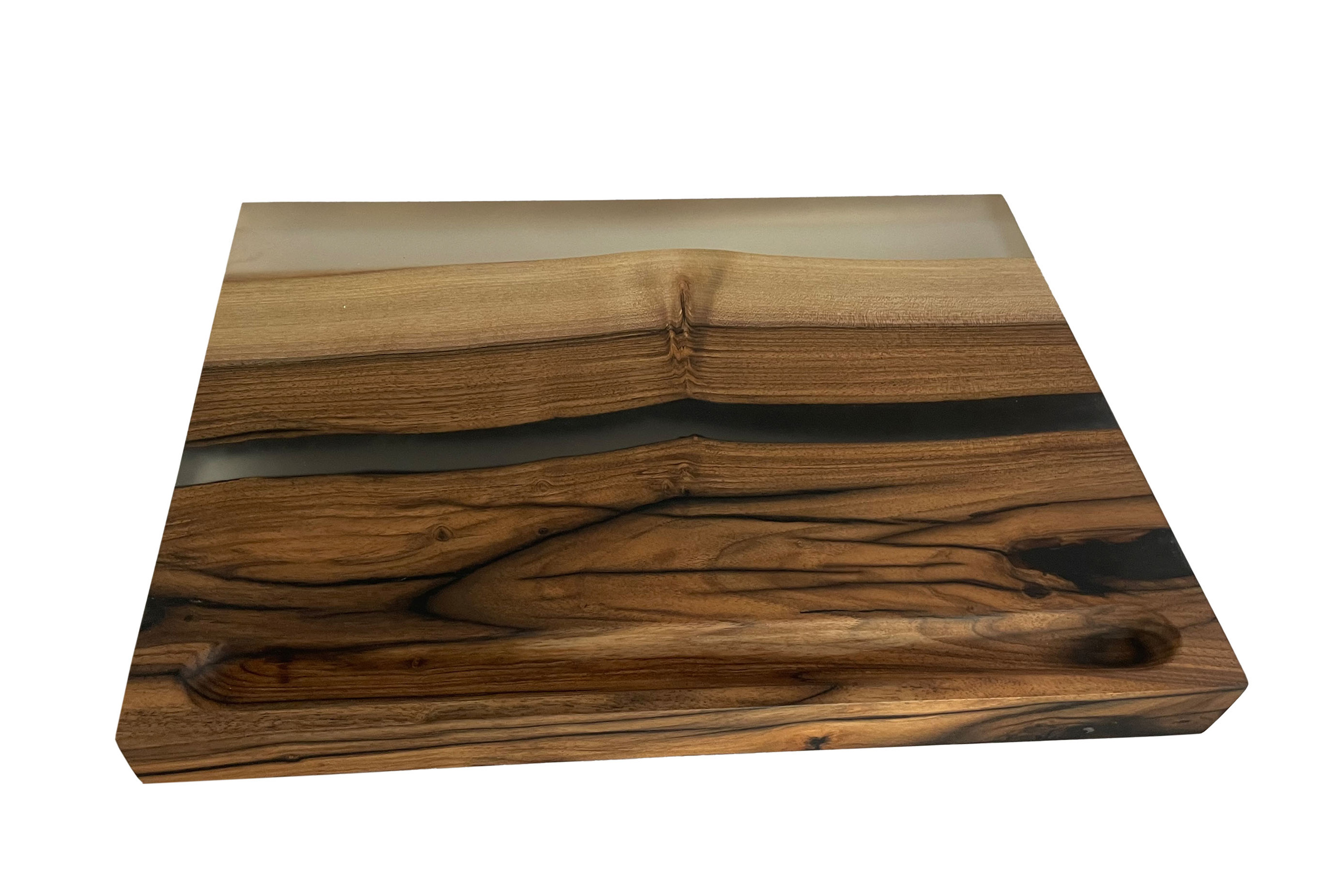 Cutting board made of walnut and cast with epoxy