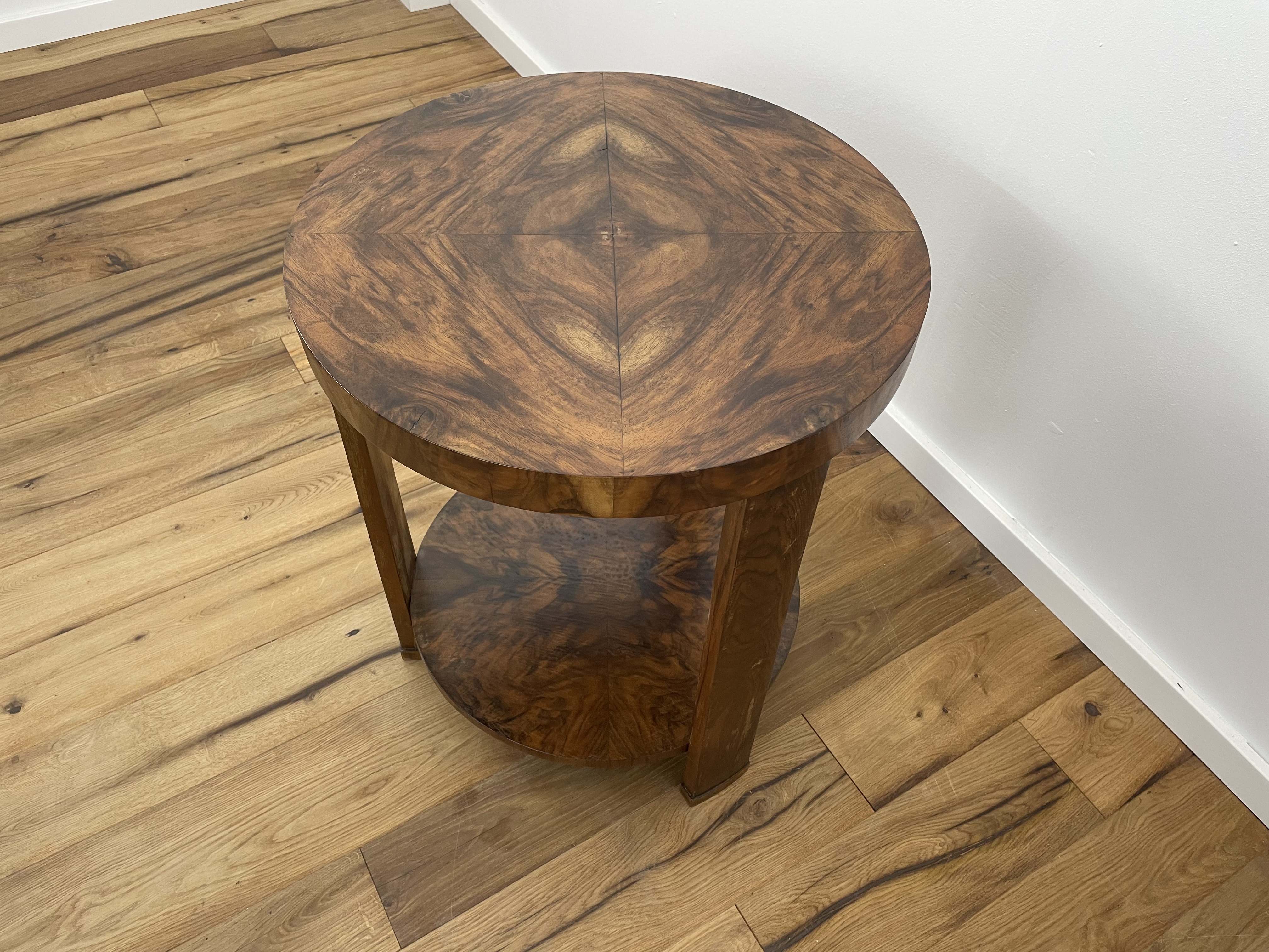 Art Deco side table with fantastic walnut veneer on three legs from near Paris around 1925