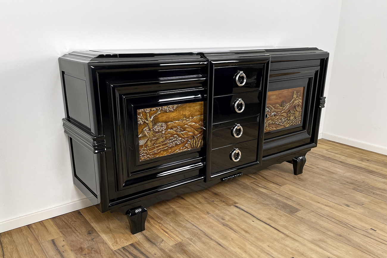 Art Deco sideboard around 1930 with two carved paintings