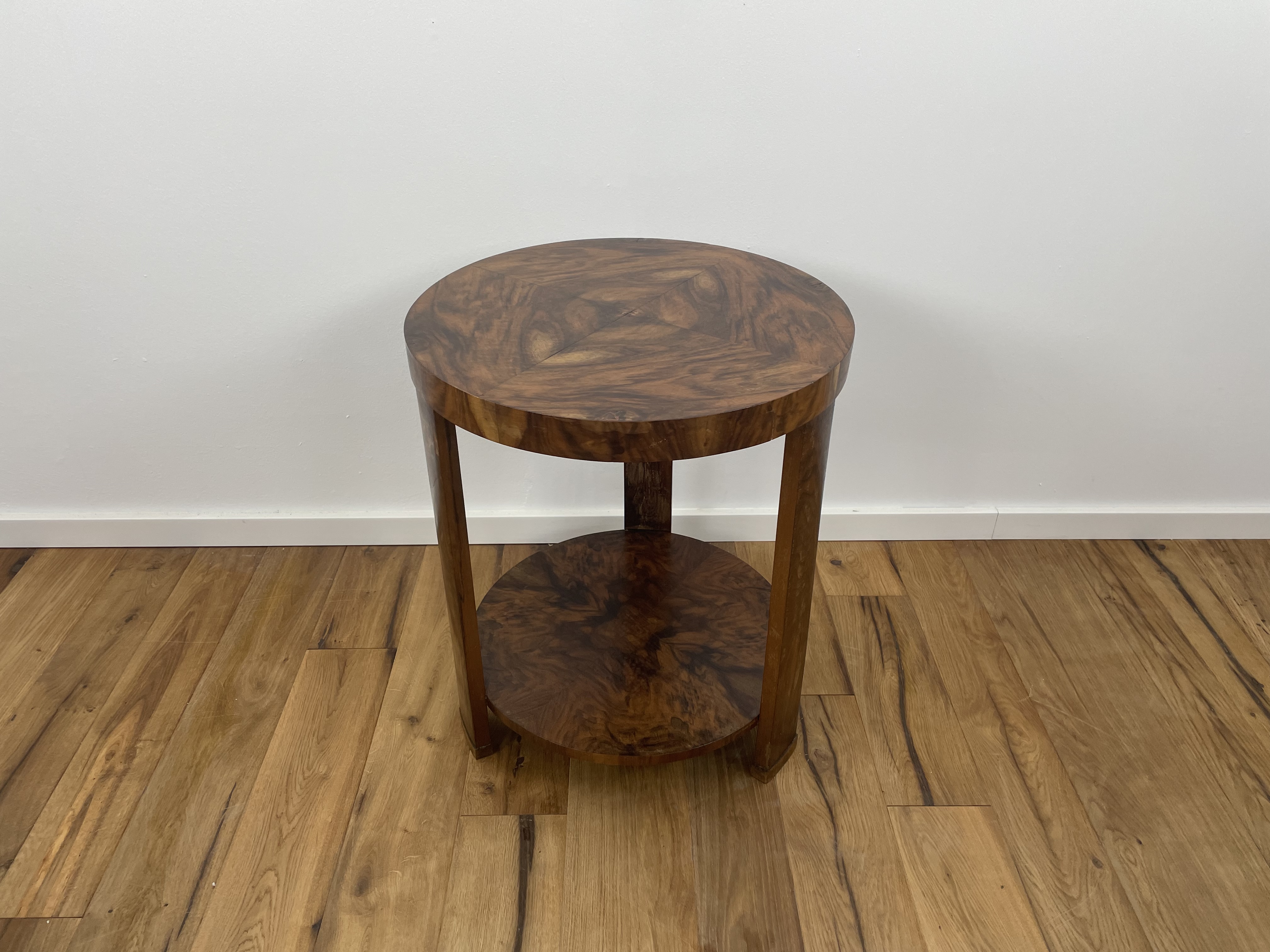 Art Deco side table with fantastic walnut veneer on three legs from near Paris around 1925