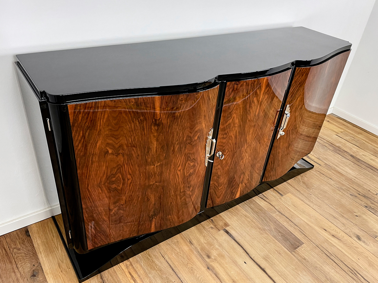 Art Deco sideboard with curved fronts in Caucasian nut from France around 1930