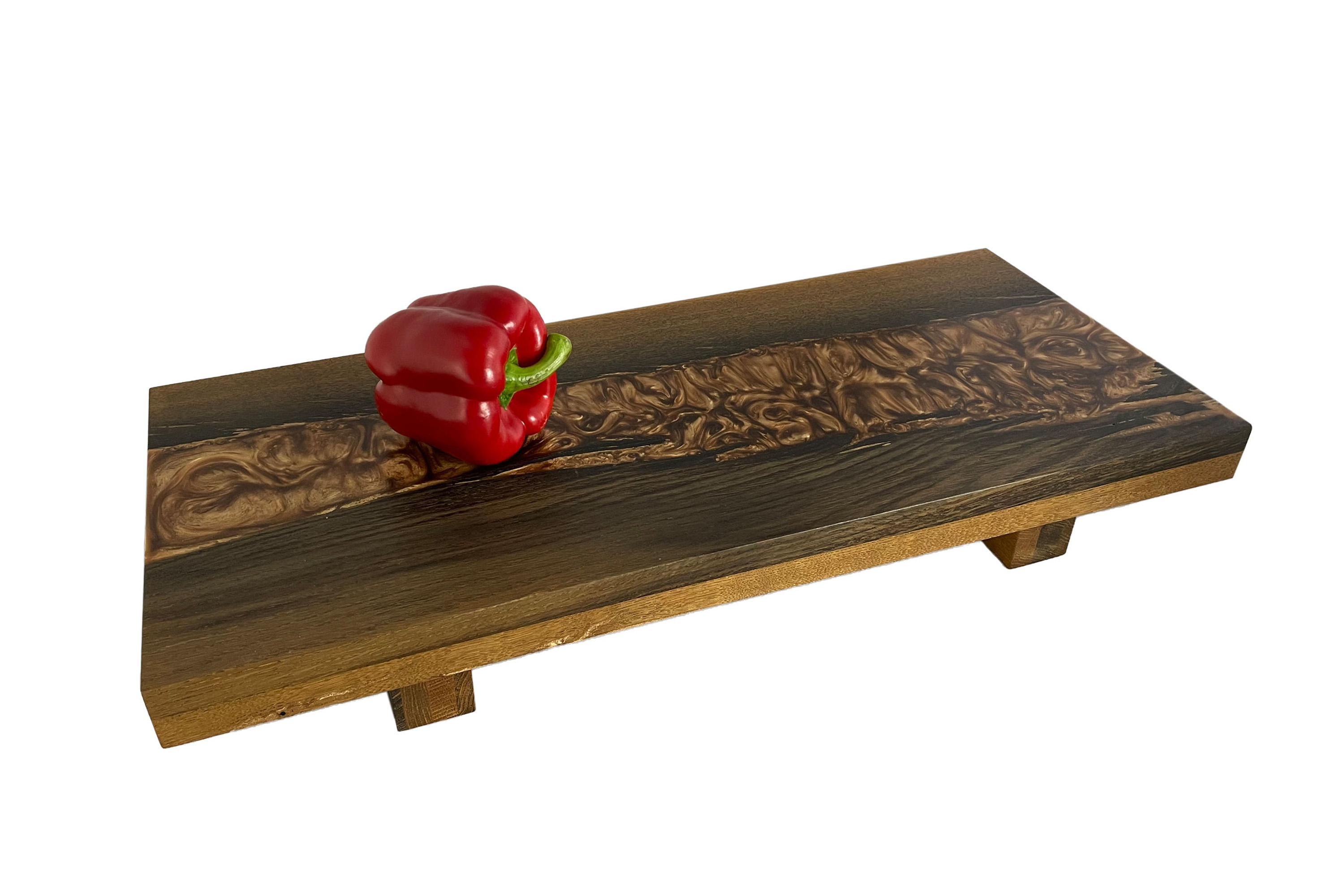 Cutting board made of bog oak refined with copper-colored expocide resin