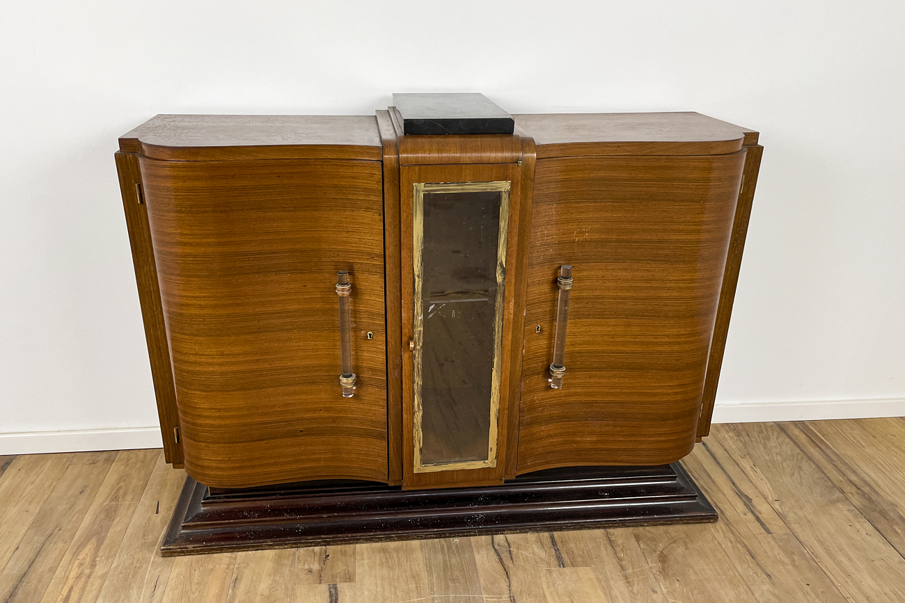 Art Deco chest of drawers in rosewood veneer with glass handles from France around 1925 with a display case