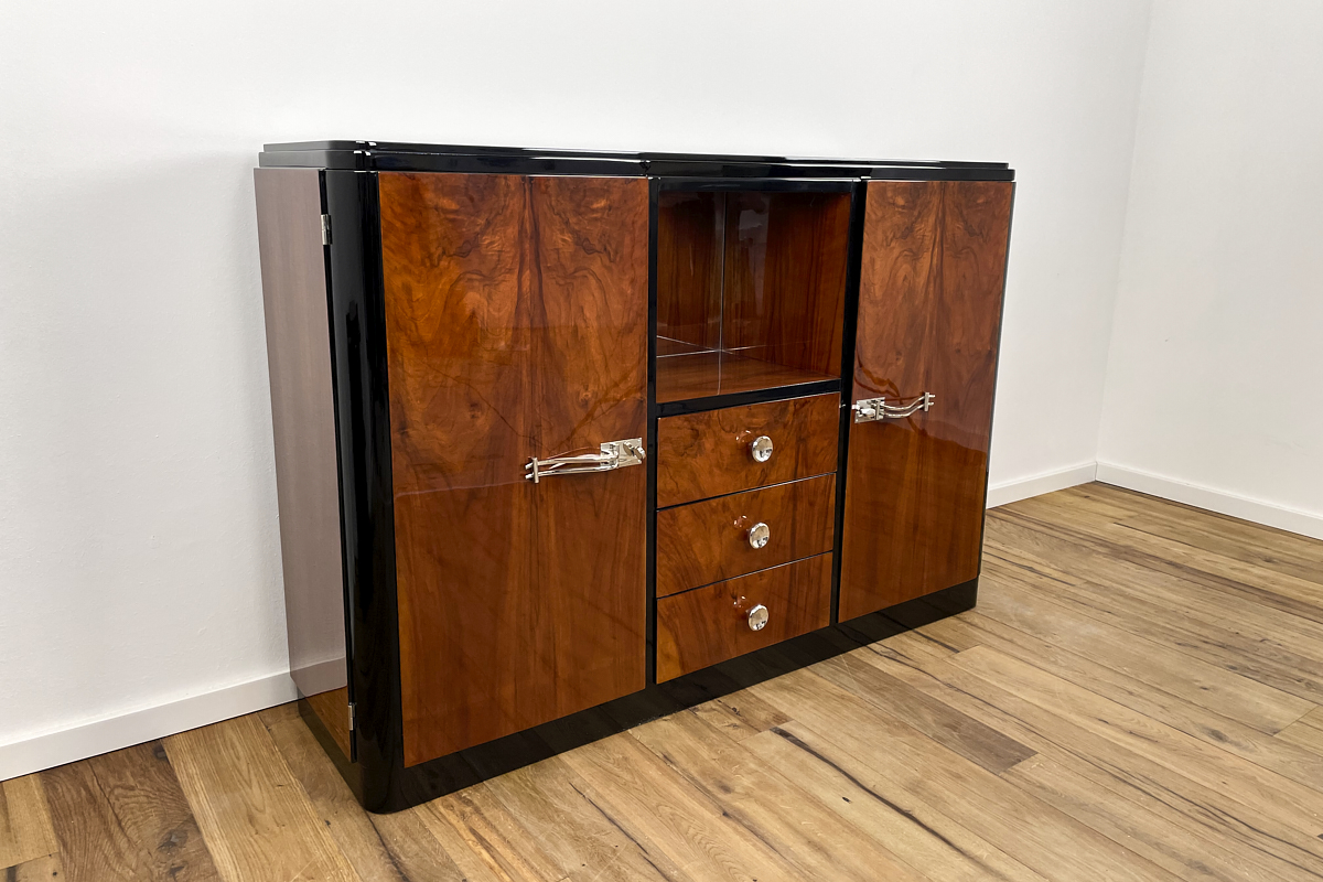 Art Deco highboard with a fantastic veneer and mirrored compartment, the original handles have been newly chrome-plated