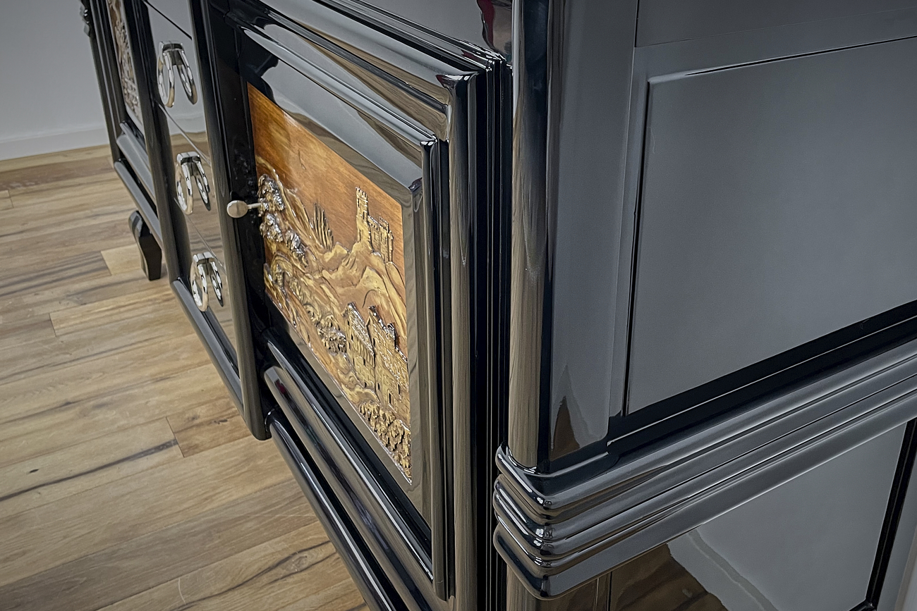 Art Deco sideboard around 1930 with two carved paintings