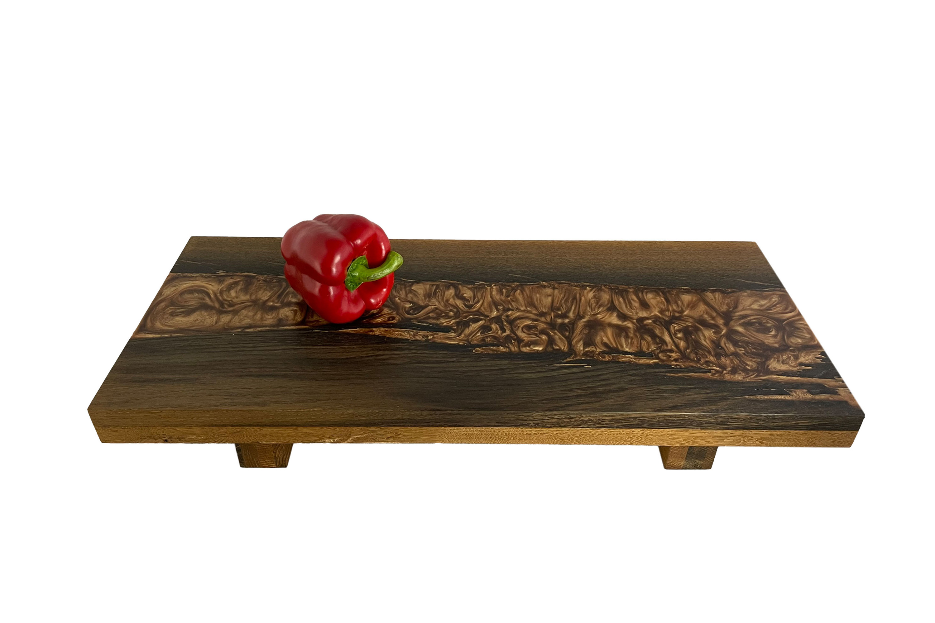 Cutting board made of bog oak refined with copper-colored expocide resin