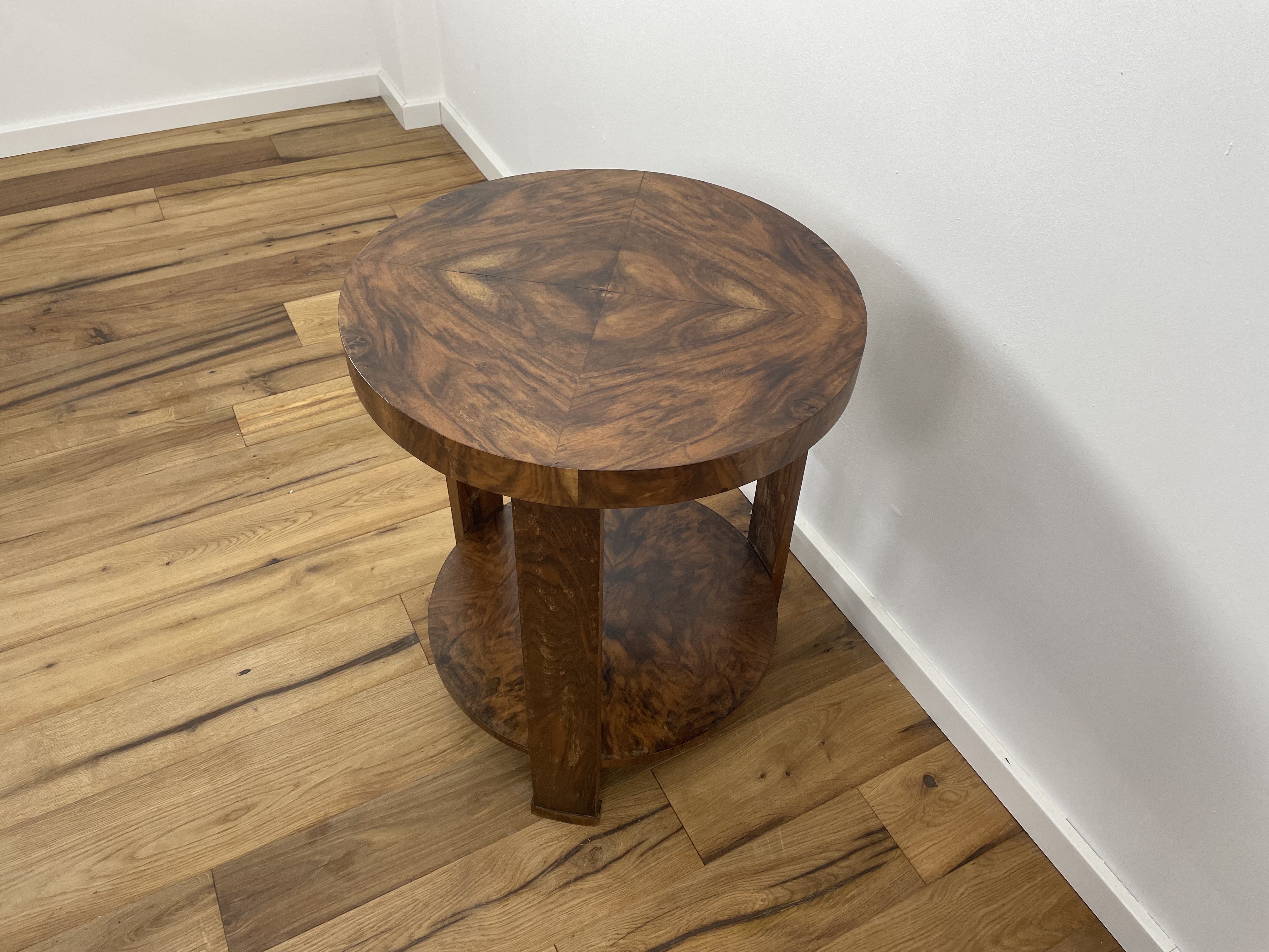 Art Deco side table with fantastic walnut veneer on three legs from near Paris around 1925